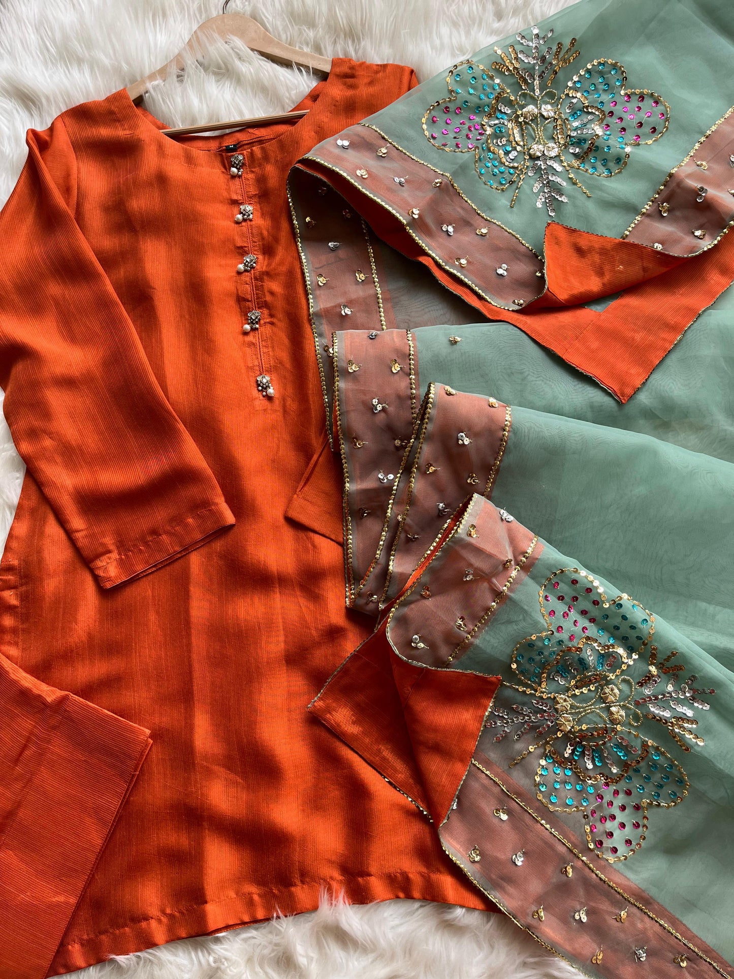 ANMOL | Neeham by AD